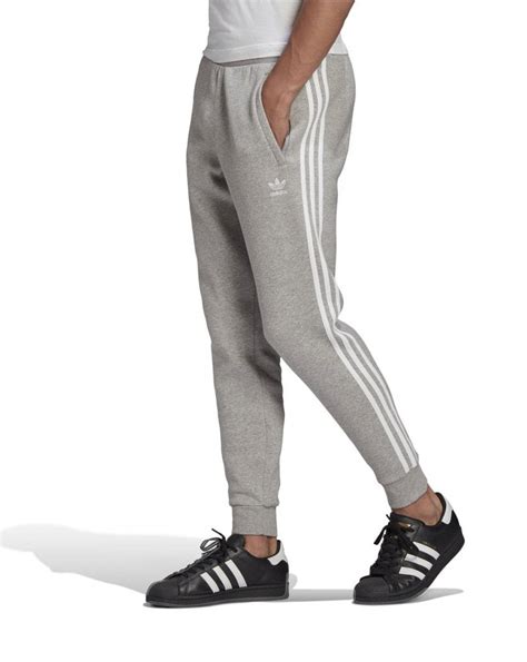 adidas original 3 stripe joggers|Adidas 3 Stripe grey joggers.